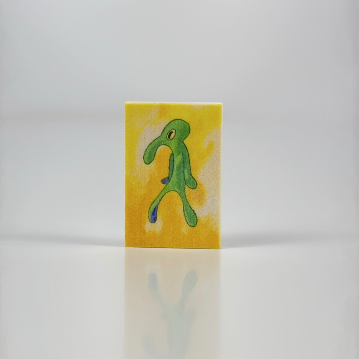 Bold & Brash abstract green figure artwork on yellow background