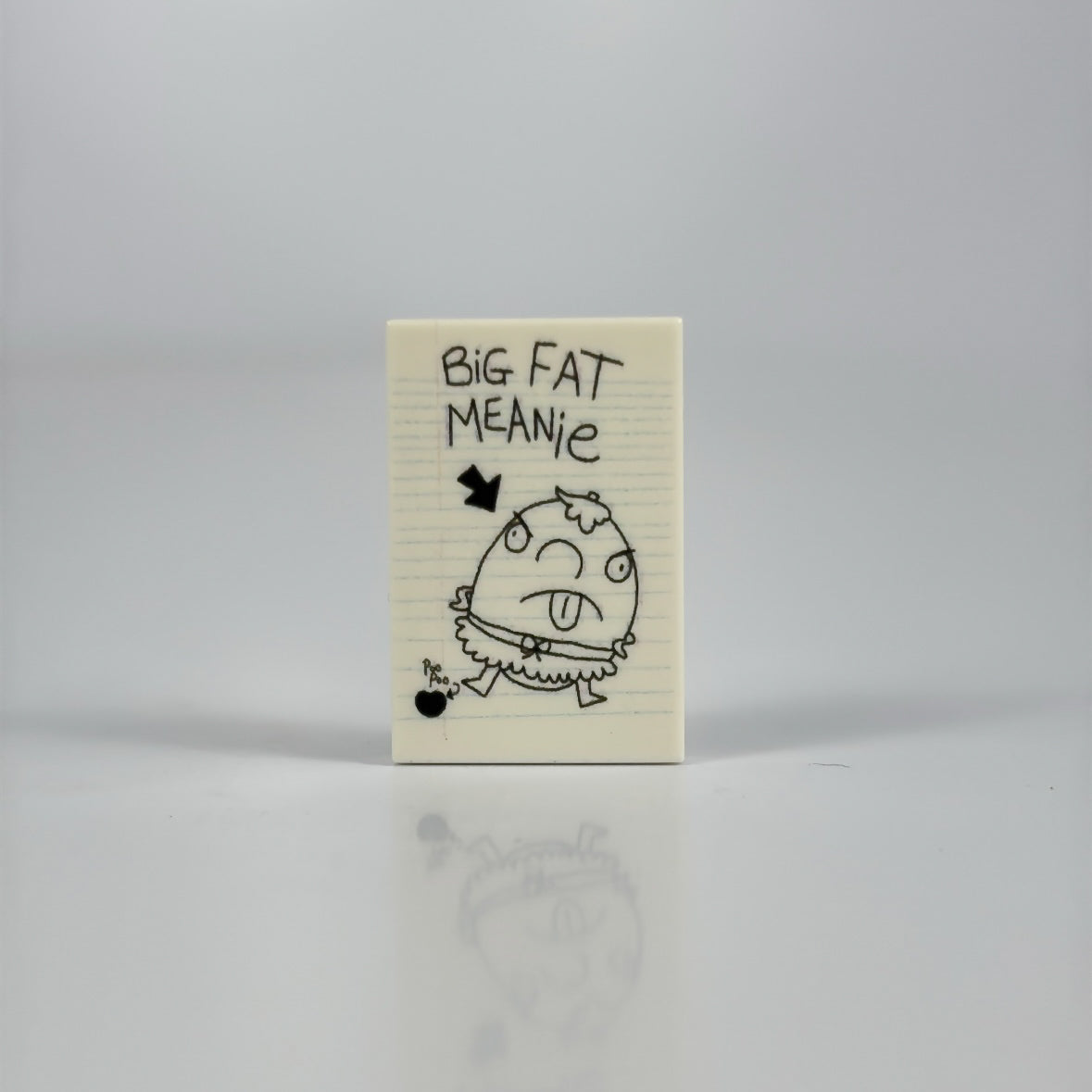 Big Fat Meanie Tile LEGO minifigure piece with trademark disclaimer