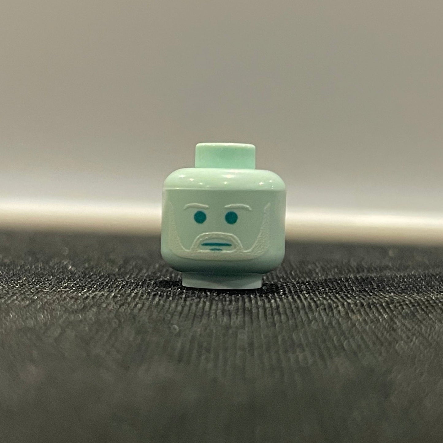 Classic Ghost Ben LEGO minifigure head with ghostly expression