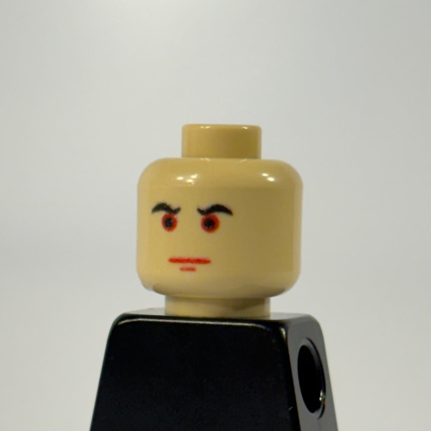 Classic LEGO minifigure head with classic bib design