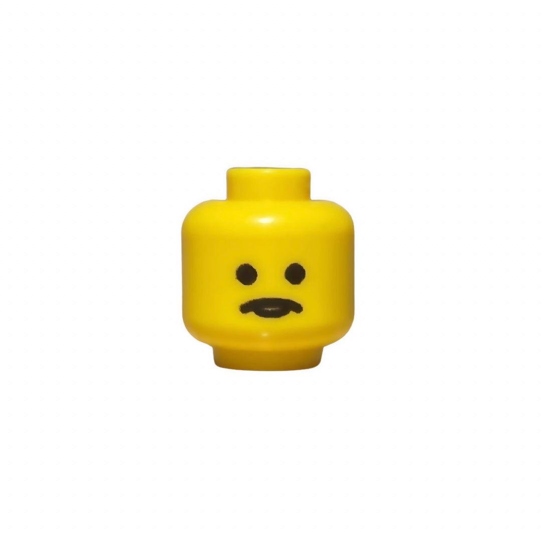yellow LEGO minifigure head with creepy mustache face