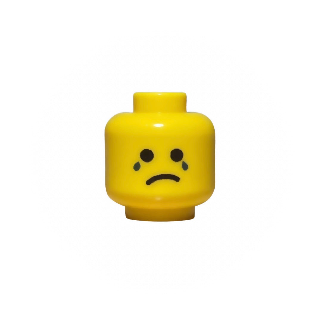 Yellow LEGO minifigure head with crying face and tears expression