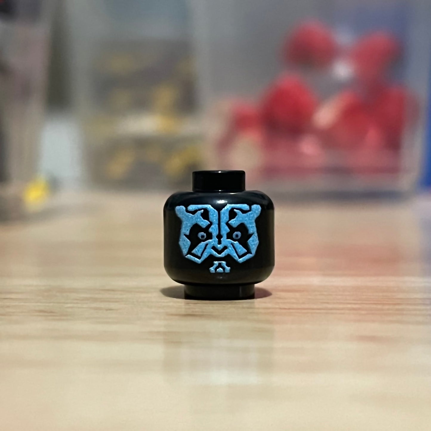 Classic Hologram Horned Sith Head LEGO minifigure head with blue facial markings on black background