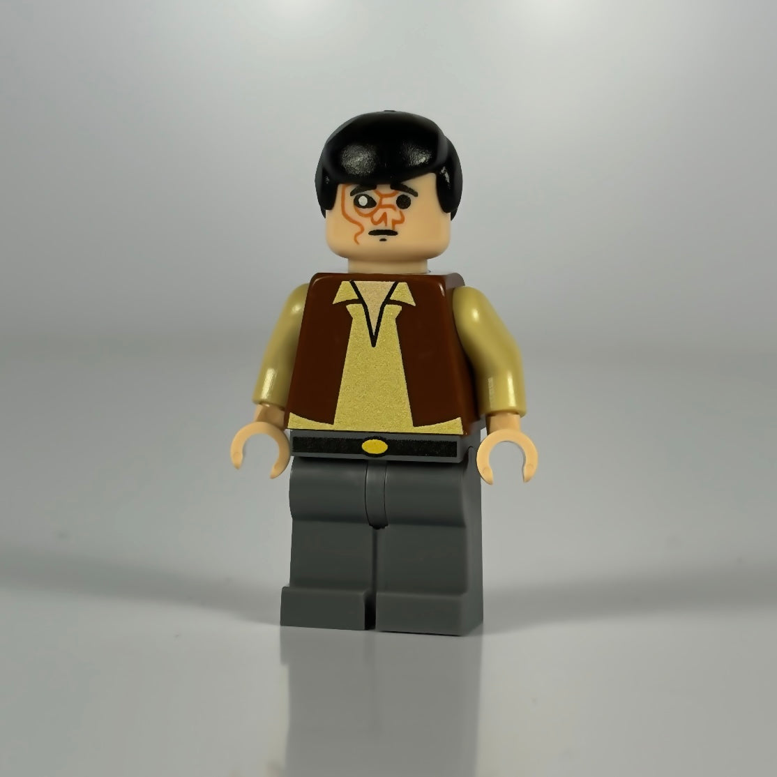 LEGO minifigure Dr. Cornelius with trademark disclaimer background