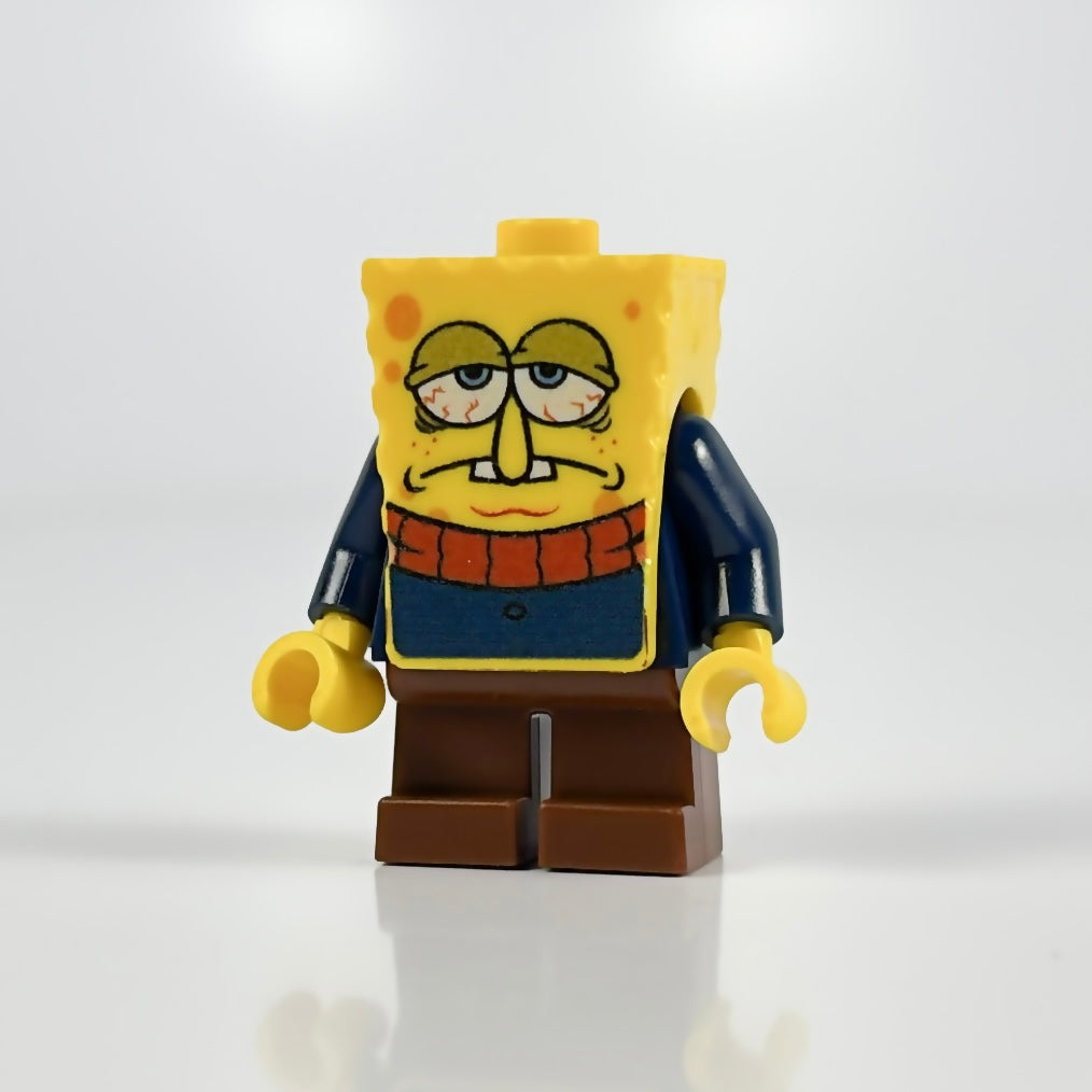 LEGO® Sudsbob minifigure with basic LEGO brick and knobs on white background
