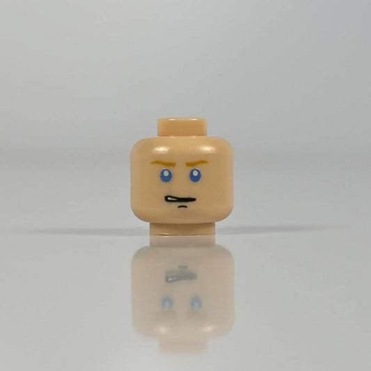 Blue eyed LEGO minifigure head gritting teeth expression