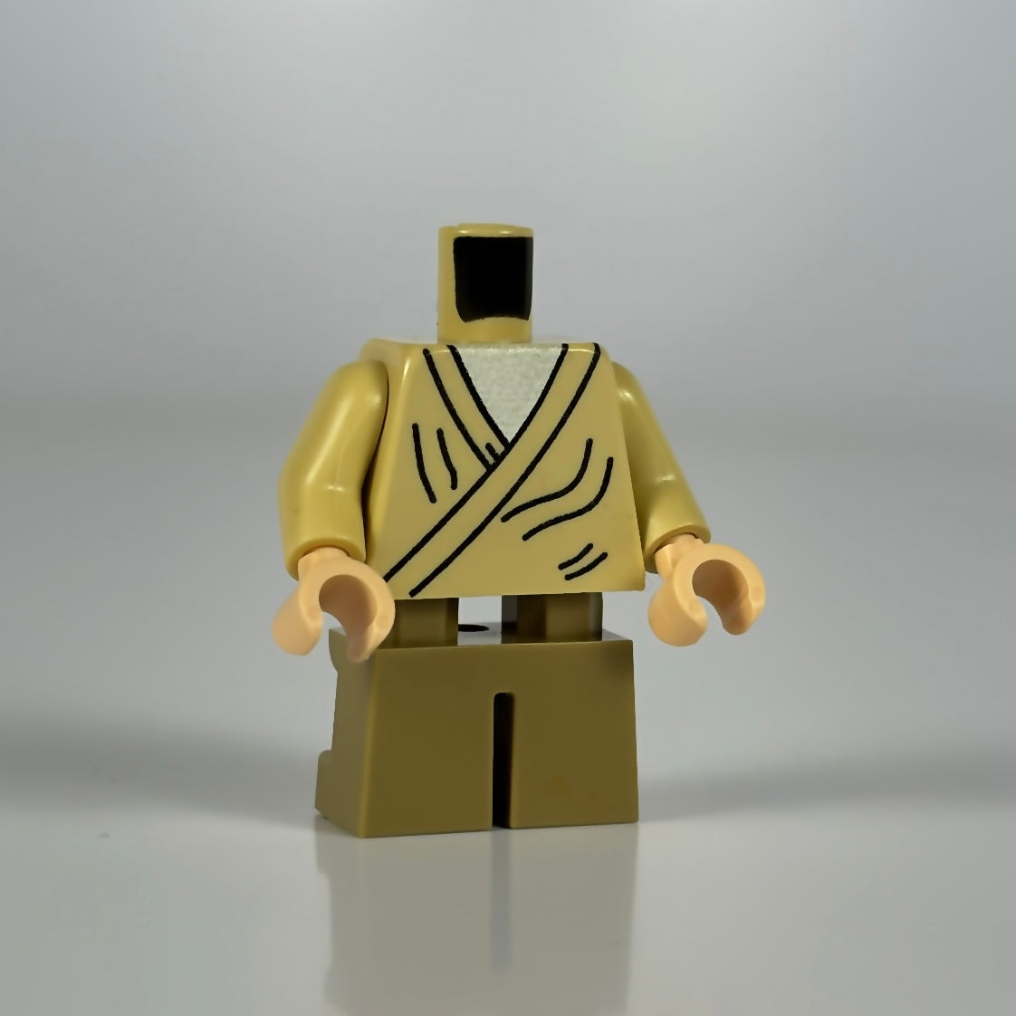 LEGO minifigure wearing tan NPC robes