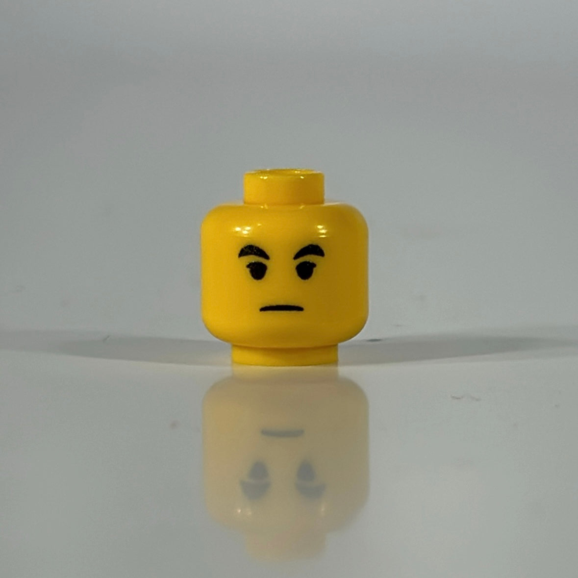 Yellow Classic Trooper LEGO minifigure head with detailed helmet design
