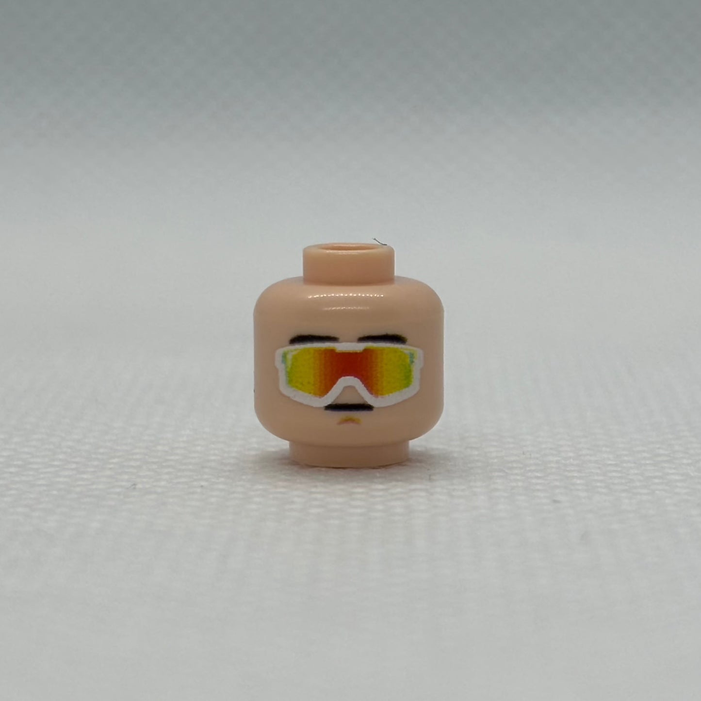 LEGO Vipers Head piece in light nougat color