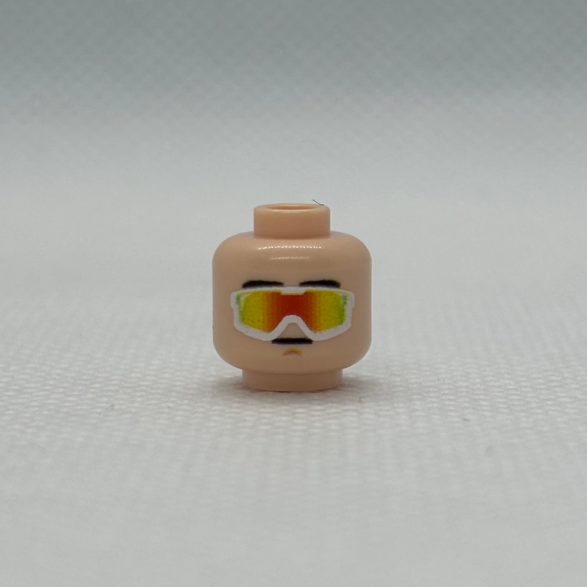 LEGO Vipers Head piece in light nougat color