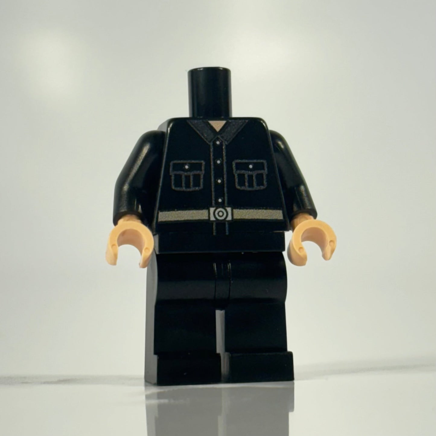 LEGO Enemy Officer minifigure in black uniform standing against white background