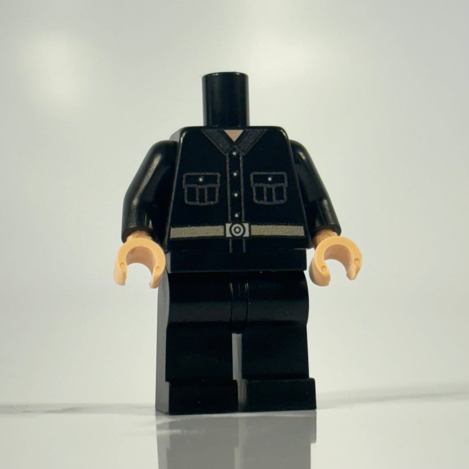 LEGO Enemy Officer minifigure in black uniform standing against white background