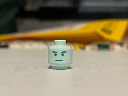 Classic Ghost Mace Head LEGO minifigure light blue face with angry expression
