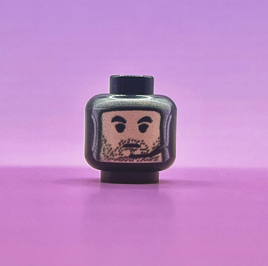 Classic Fett Head LEGO minifigure head with stubble on purple background