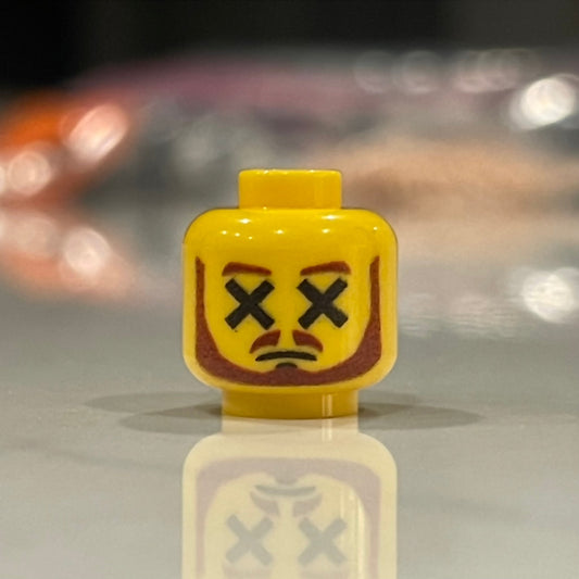 Classic Dead Master yellow LEGO minifigure head with crossed-out eyes and goatee