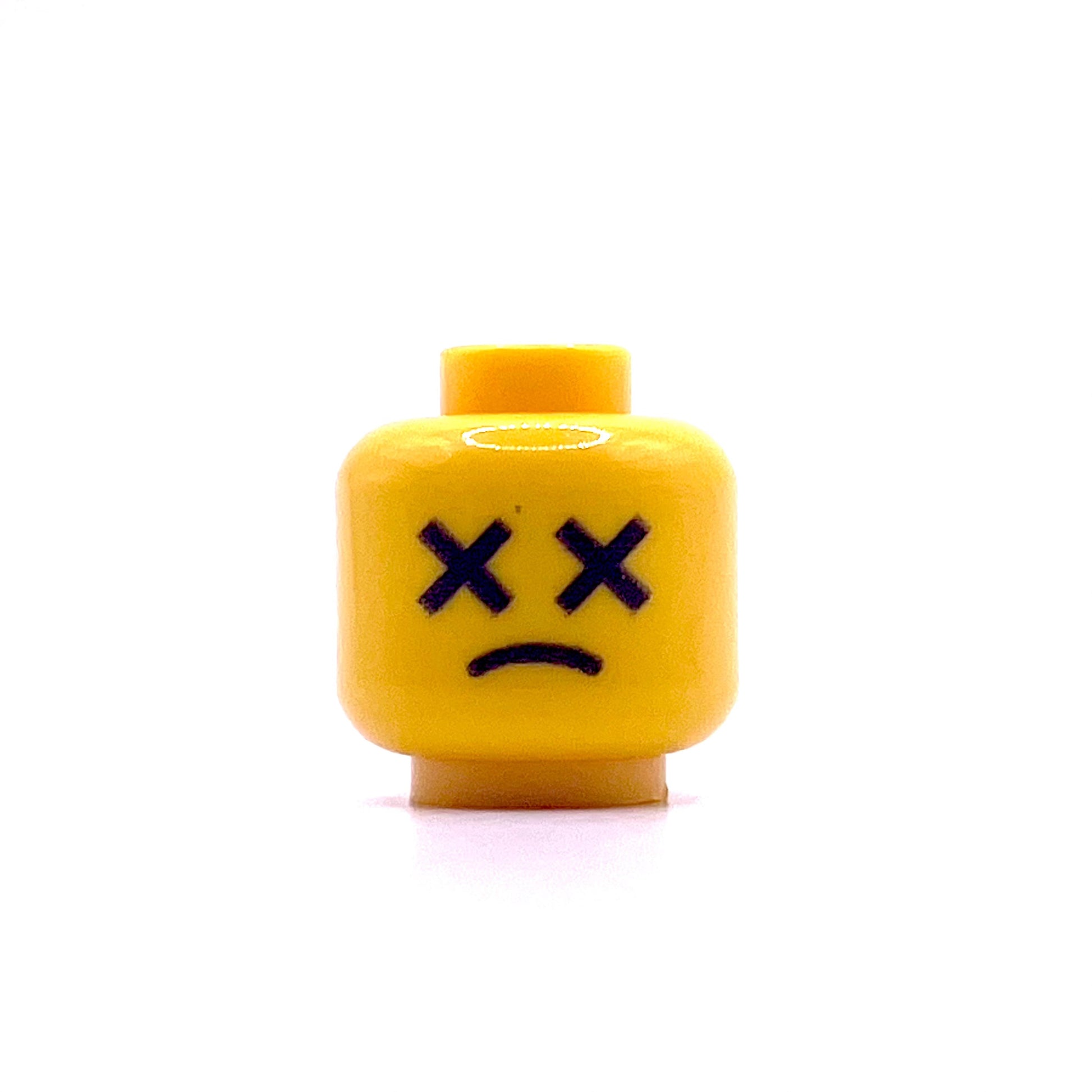 Classic Dead Guy Head LEGO minifigure yellow head with X eyes and sad mouth expression