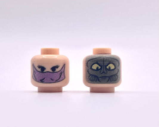 Classic Zamn Head Pack showing two LEGO-style minifigure heads with unique facial expressions on a plain background