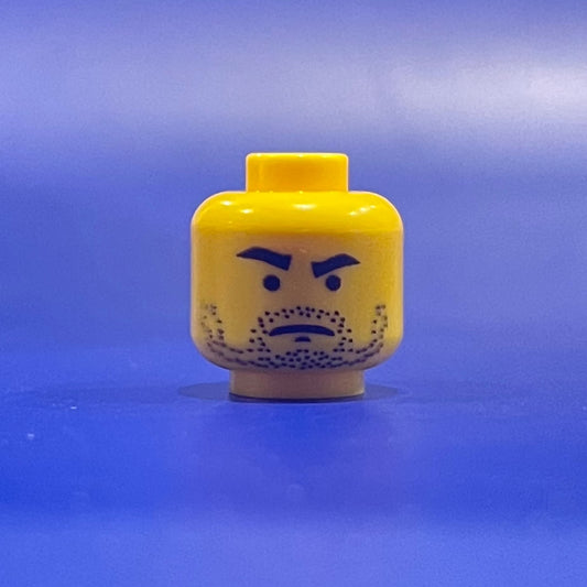 Classic Cantina Server Head Yellow LEGO minifigure face with stubble and stern expression on blue background