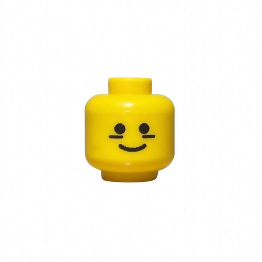 Yellow LEGO football player head with simple smiling face and black markings